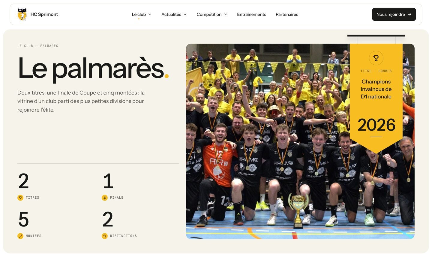 Page Palmarès : la photo du titre 2026 et la bannière jaune des champions